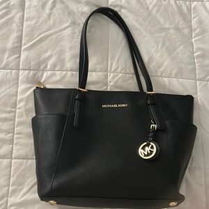 Michael Kors black with gold bag